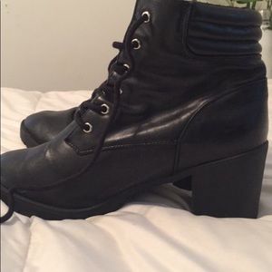 Laced up black boots